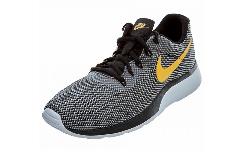 nike tanjun negro dorado