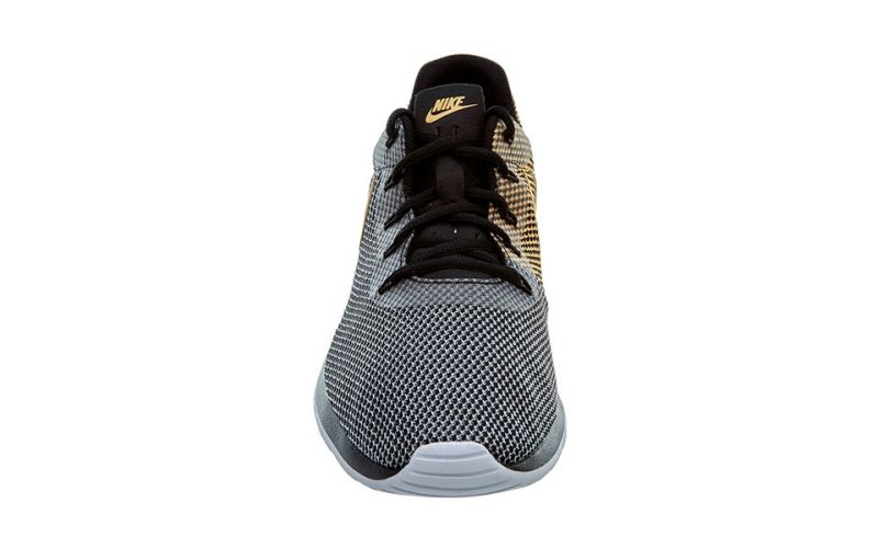 nike tanjun negro dorado