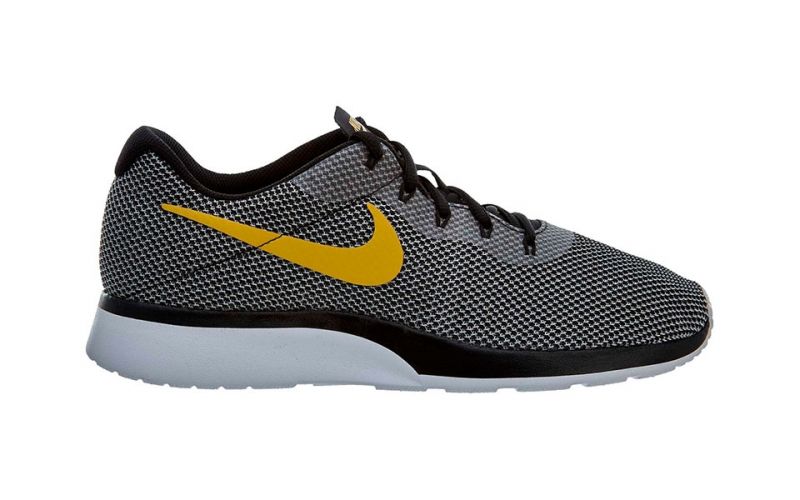 concepto Insistir Recordar Nike tanjun Racer Negro Dorado | Estilo elegante y casual