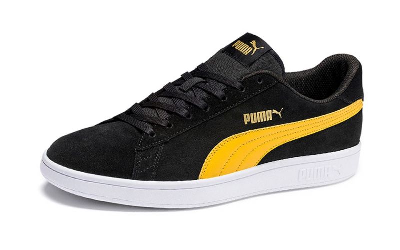 black and yellow puma shoes