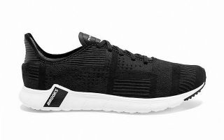 Brooks PUREBEAT NEGRO BLANCO MUJER 1202891B035