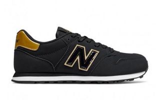 new balance negro con dorado