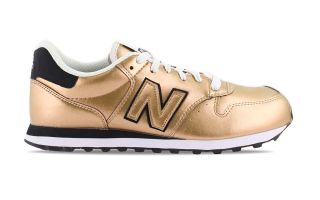 NEW BALANCE GW500 DORADO NEGRO MUJER GW500MTG
