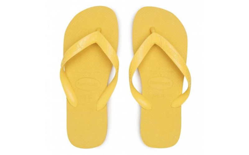 mustard colored flip flops
